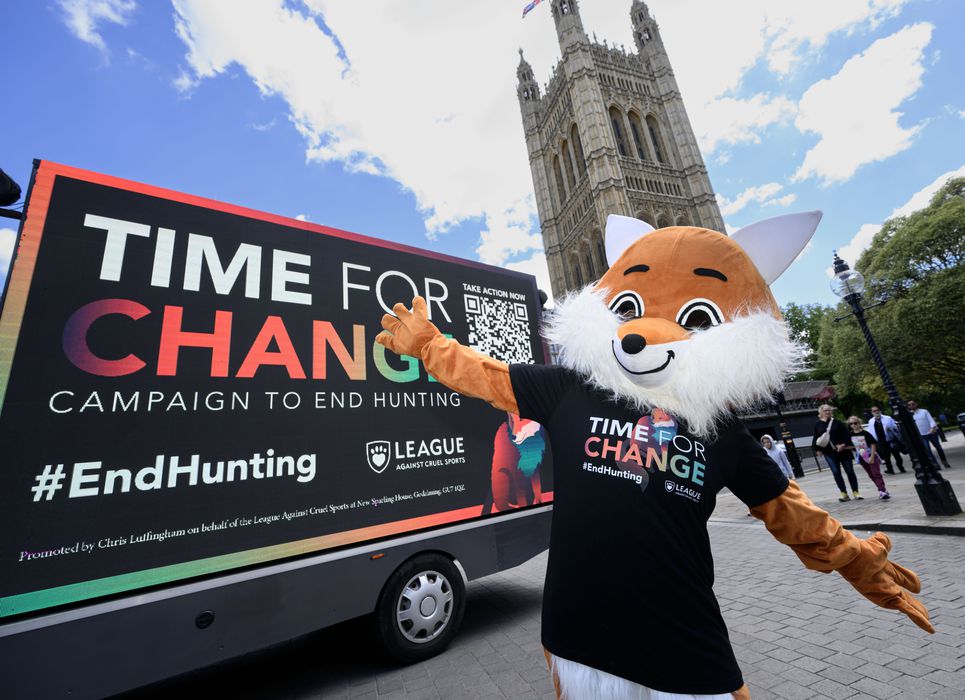 The League fox stands outside parliament